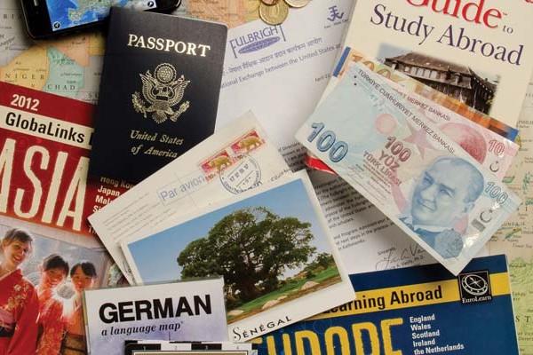 world map, passports, and currency
